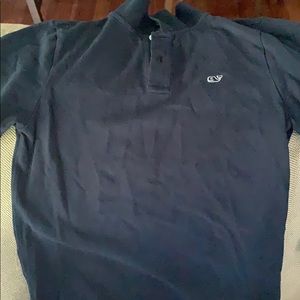 Medium dark navy boys polo style shirt.